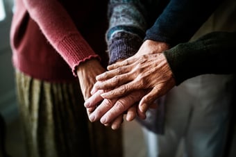Closeup of hands of group of seniors, licensed by Rawpixel